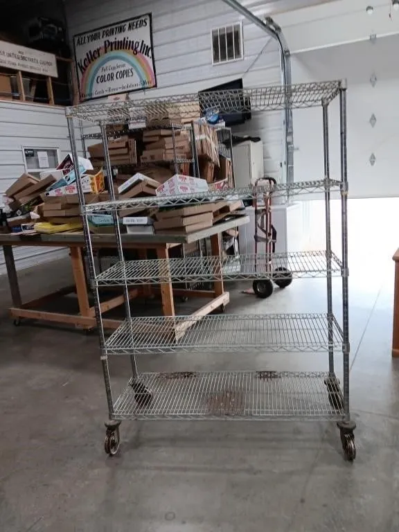 Five Tier Rolling Wire Rack. Approx 68x48x18.