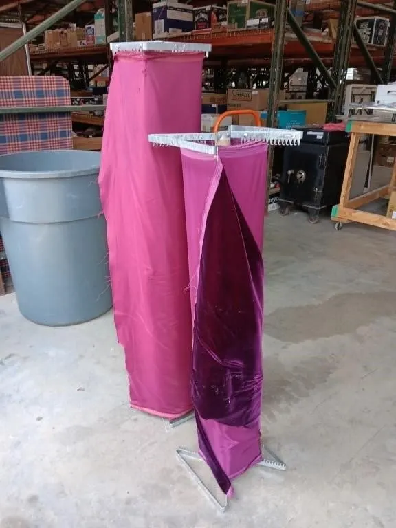 Two metal fabric end clamps, approximately 51in &