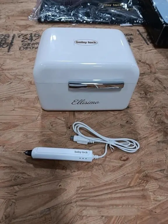Baby Lock Sensor Pen & Baby Lock Accessory Box.