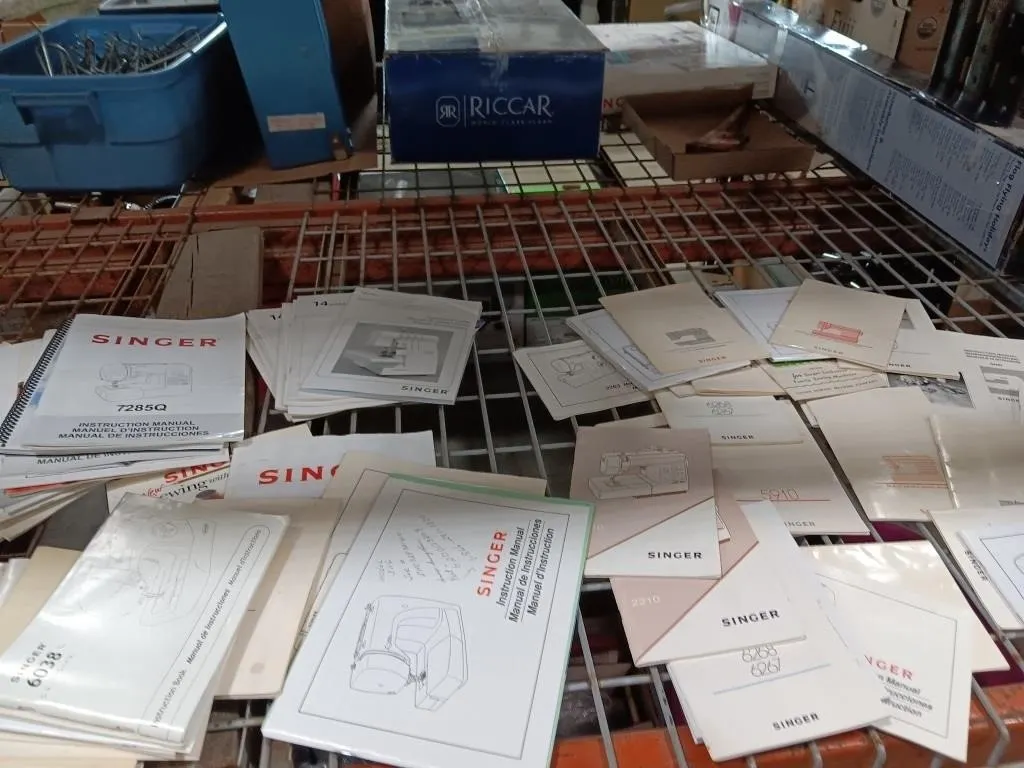 Assortment of Singer sewing/embroidery machine