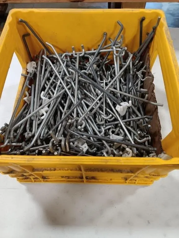 Crate of wall hanging brackets of different sizes