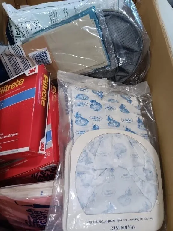 Large assortment of vacuum bags & some filters