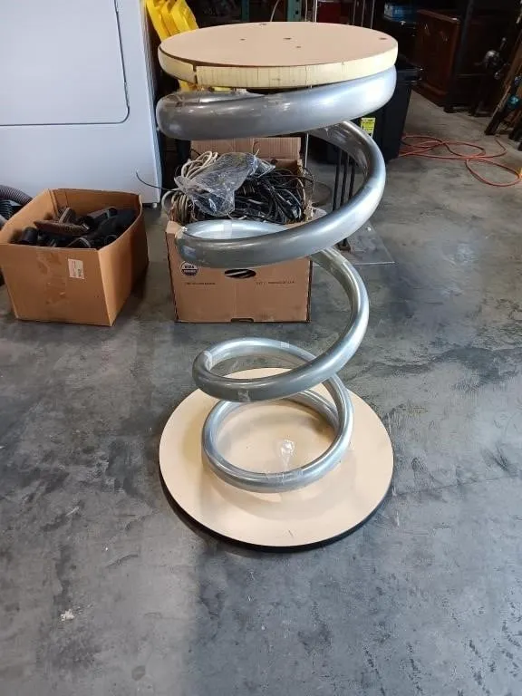 Heavy duty stool/side table with steel coil