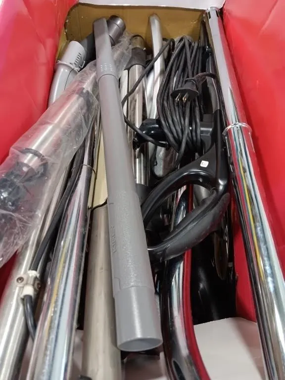 Assortment of vacuum wand and tubing