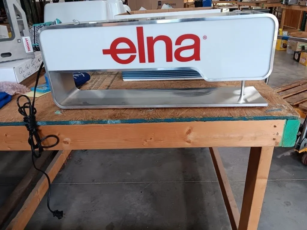 Elna Hanging Light. Turned On At Lotting Time.
