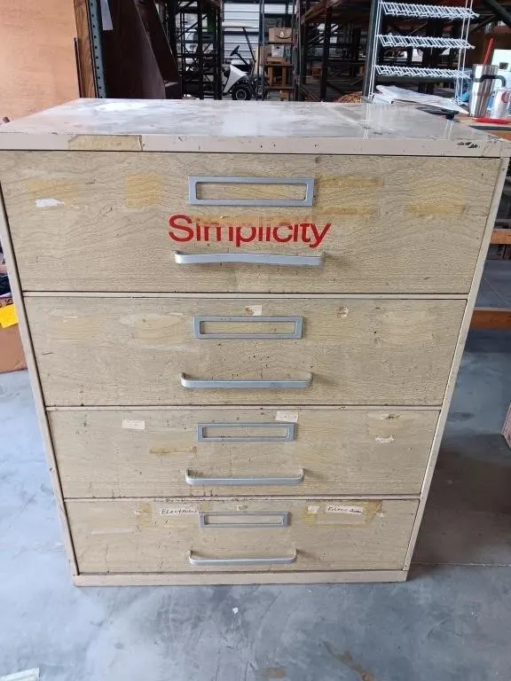 Metal 4 drawer cabinet approximately 33x25x42, w3