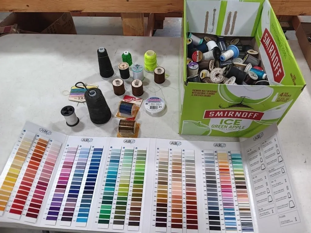 Assortment of threads and display folder
(New