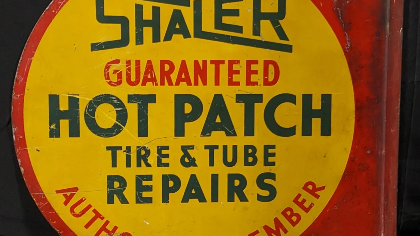 TIN FLANGE SIGN SHALER GUARANTEED HOT PATCH TIRE & TUBE REPAIRS AUTHORIZED MEMBER