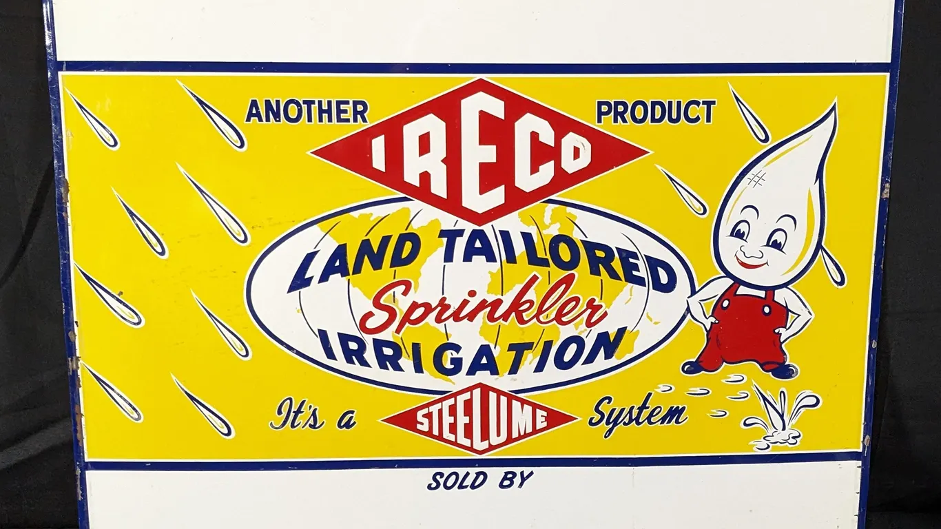 EMBOSSED TIN SIGN IRECO LAND TAILORED SPRINKLER IRRIGATION