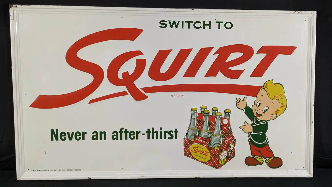 EMBOSSED TIN SIGN SWITCH TO SQUIRT NEVER AN AFTER THIRST "TARTAN CARTON"