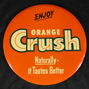 CELLULOID SIGN ENJOY ORANGE CRUSH NATURALLY - IT TASTES BETTER