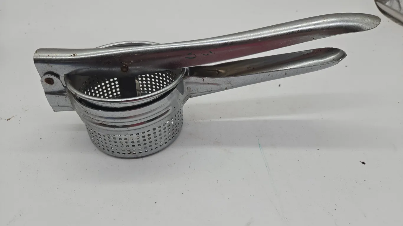 Vintage stainless steel potato ricer