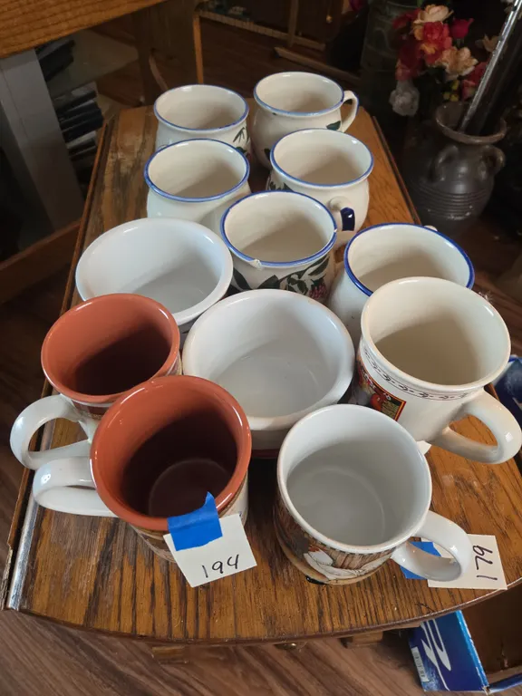 Assorted soup bowls and rooster mugs