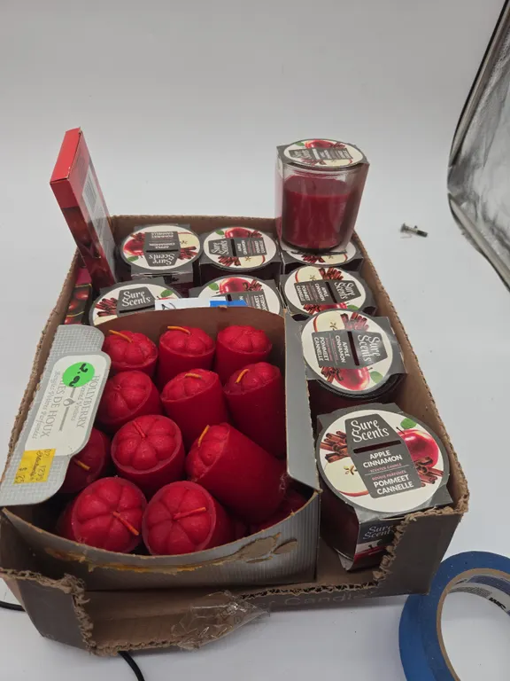 Large assortment of new candles