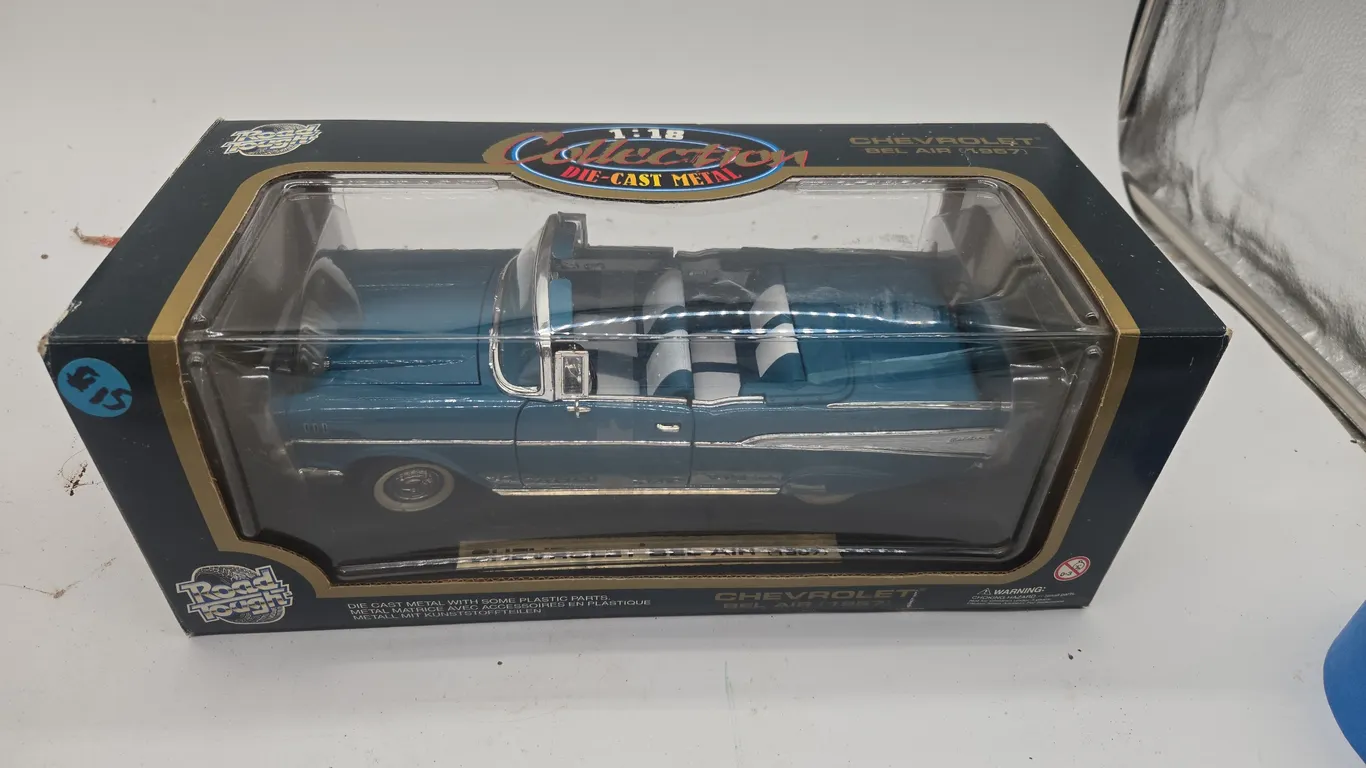 Vintage 1957, Chevrolet bell air convertible. Diecast car in original box.