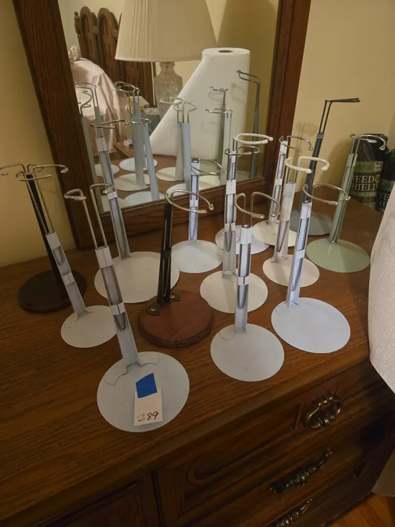 Assorted doll stands