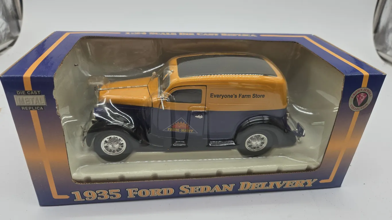 Vintage 1935 Ford sedan, delivery diecast, car in original box.