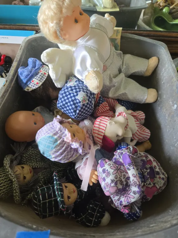Assorted mini porcelain dolls