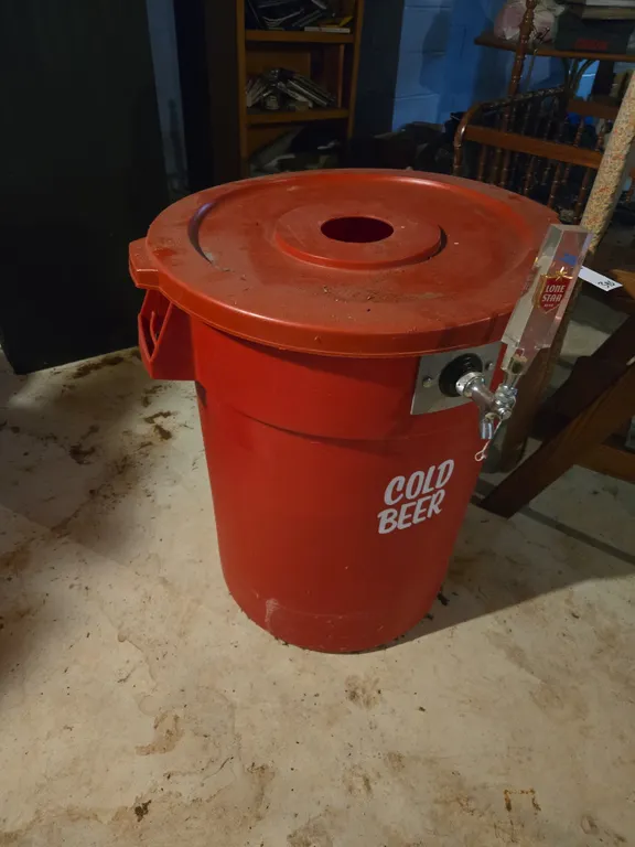 Beer keg, garbage can
Tap