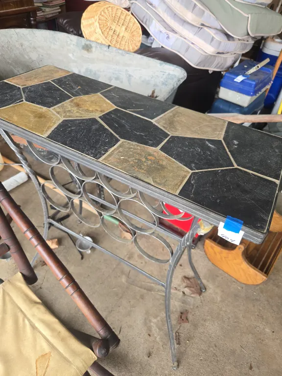 Slate topped wrought iron table