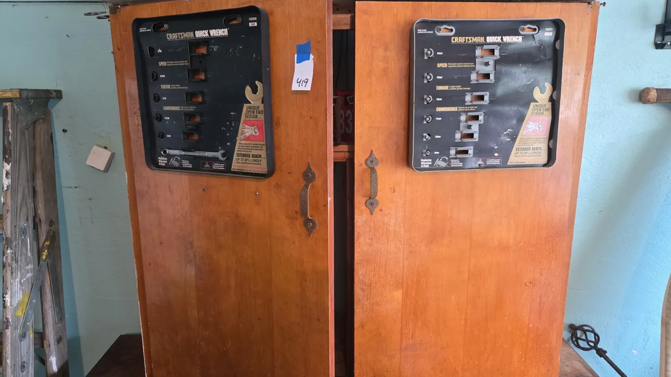 Wooden cabinet and contents