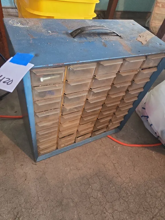 Metal parts caddy with hardware