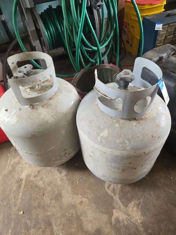 Twenty pound propane tanks empty