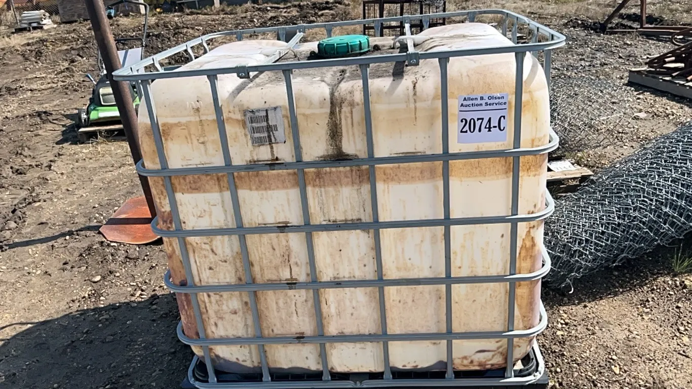 1000 LTR POLY TOTE IN METAL CAGE