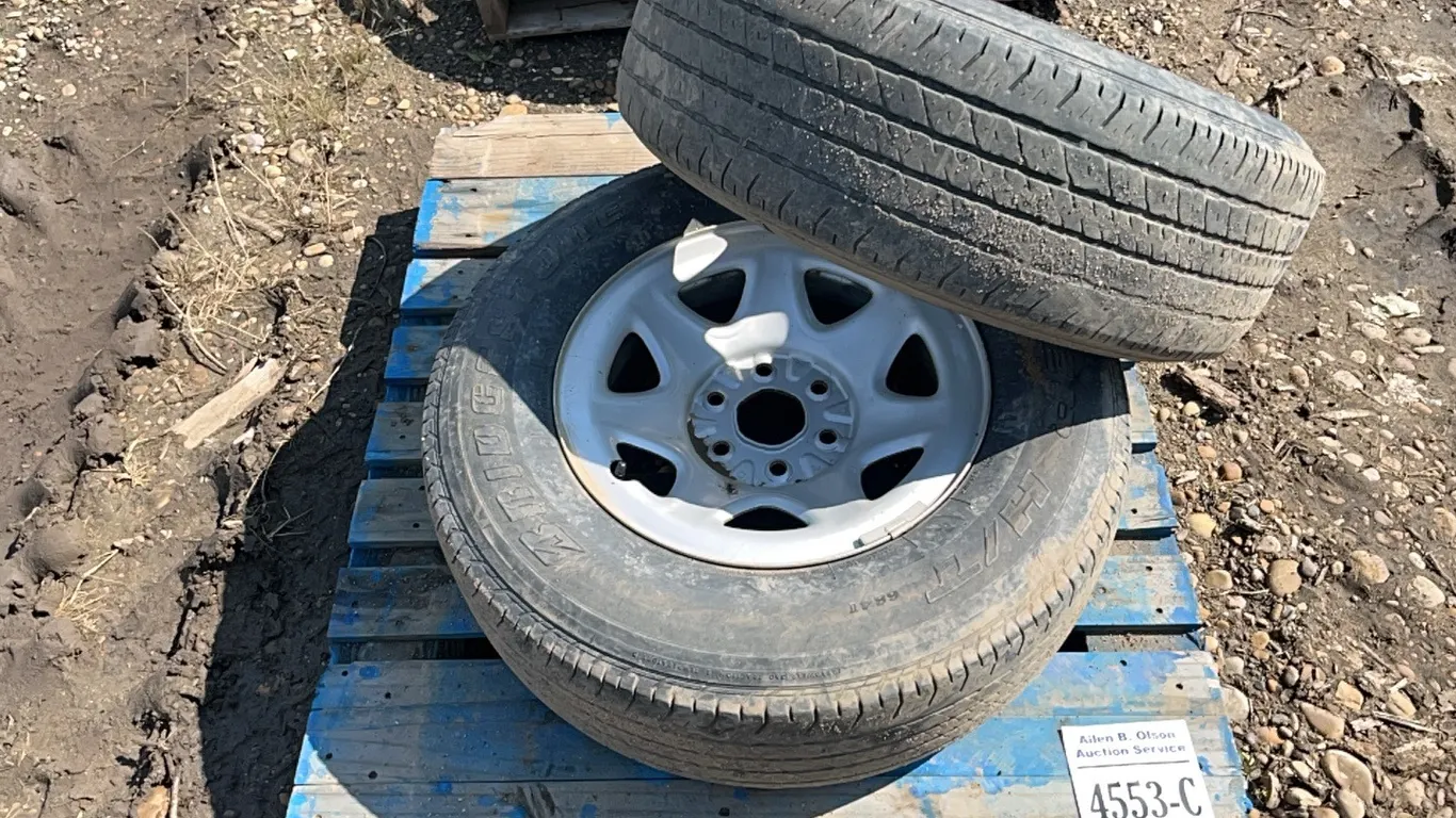 2 - BRIDGESTONE 255/70 R17 TIRES ON 6 BOLT RIMS