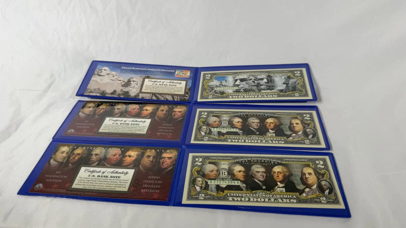 TWO DOLLAR BILLS WITH COLLECTORS BOX