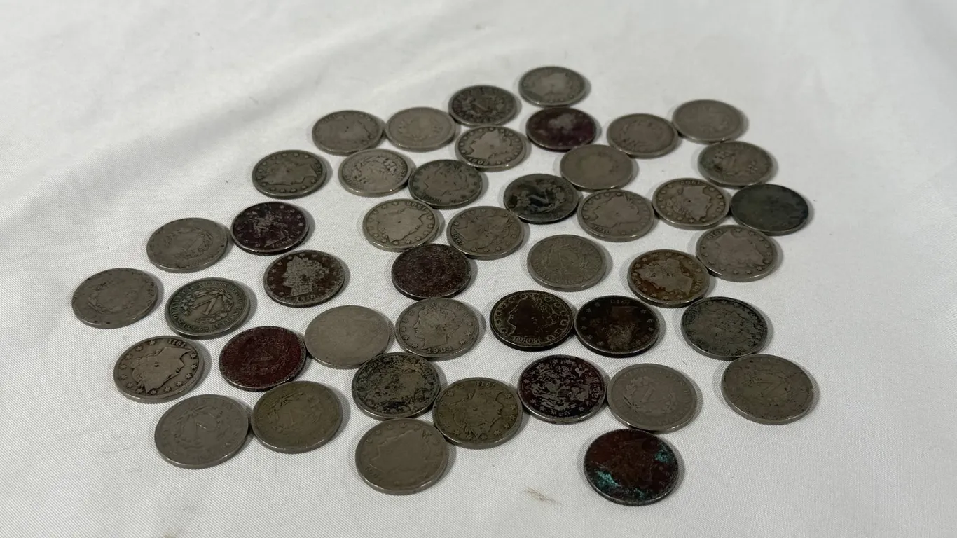 (44) V NICKELS MIX DATES