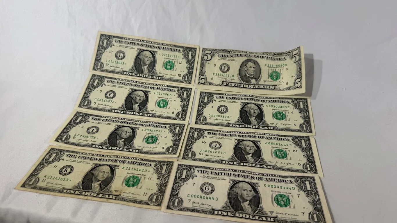 ONE DOLLAR BILLS WITH SERIAL NUMBERS AND STAR NOTES
