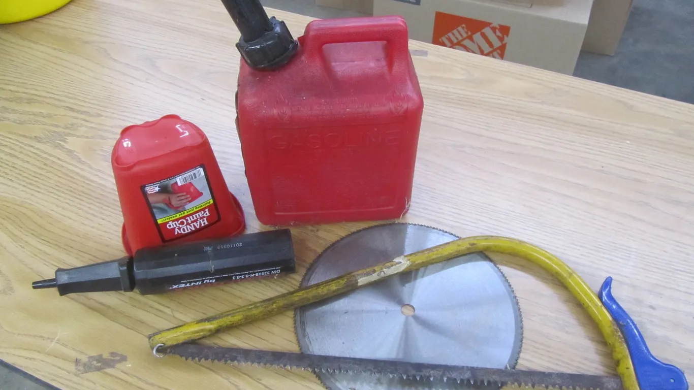1 Gallon Gas Can, Small Bow Saw, Paint Cup, And More