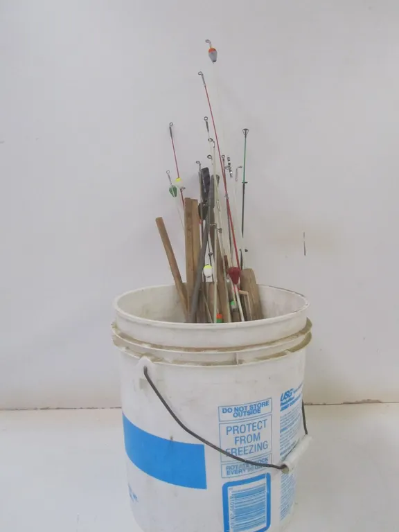 Bucket Full Of Assorted Ice Fishing Rods