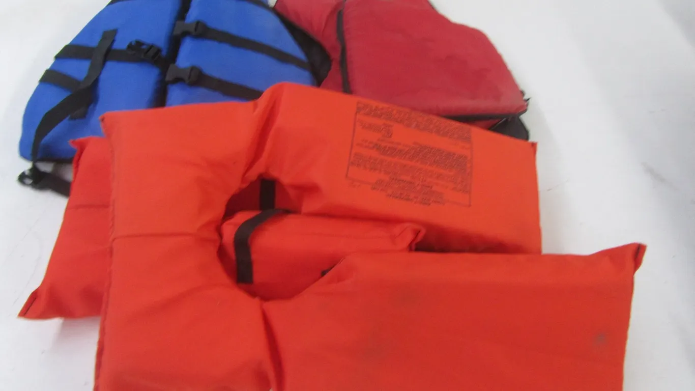 (4) Assorted Life Jackets