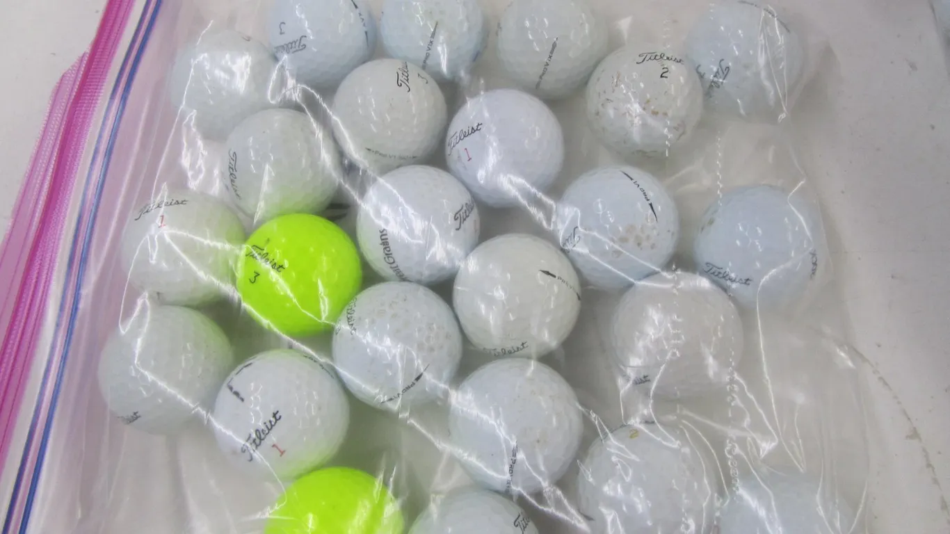 (24) Assorted Titleist Golf Balls