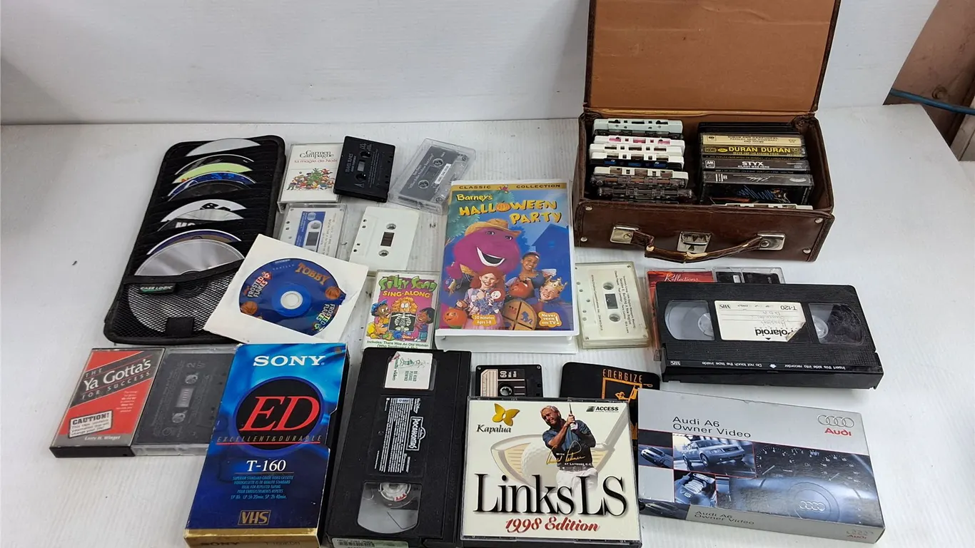 Assorted CD, VHS & Audio Tapes