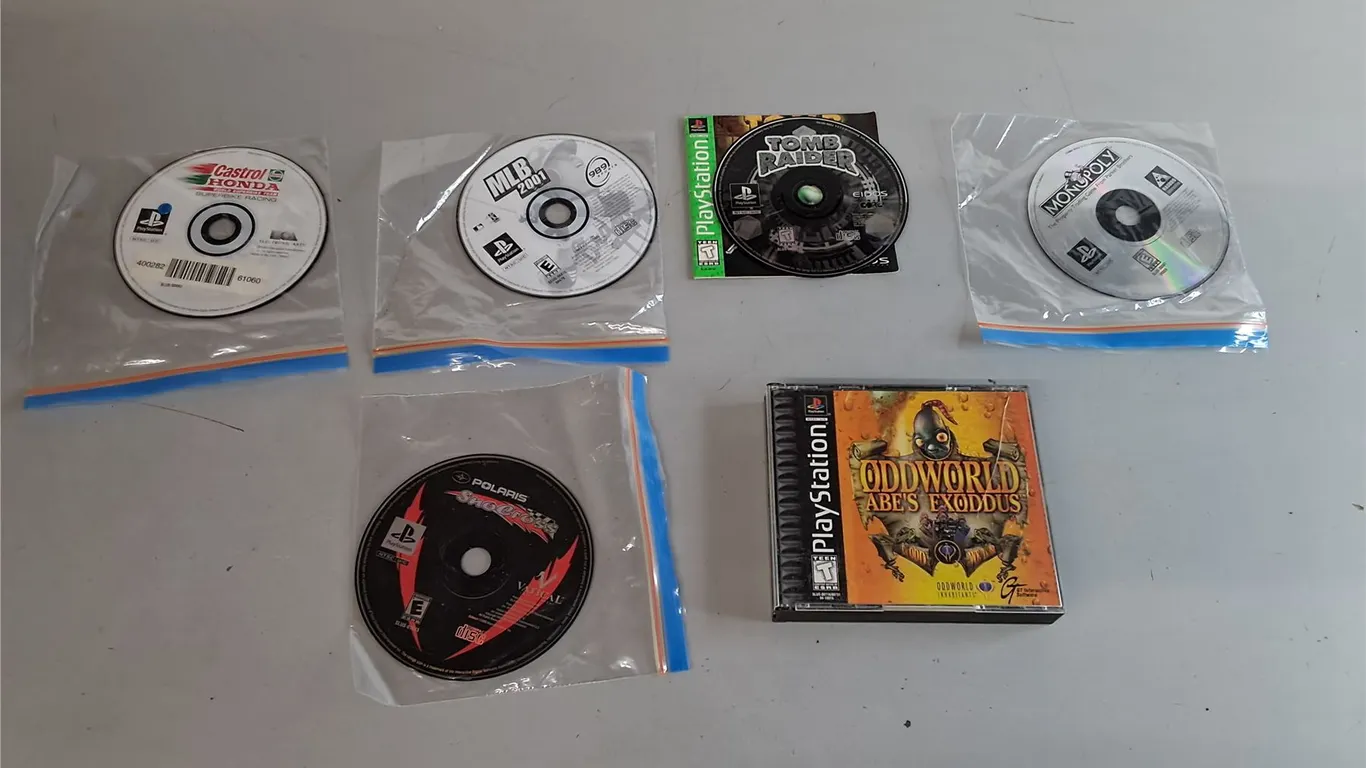 (6) Play Station Games- Tomb Raider, Monopoly, SnoCross, Misc.