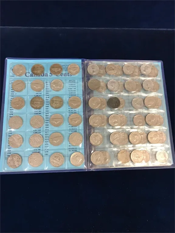 Book of 67 Canadian & USA Nickels