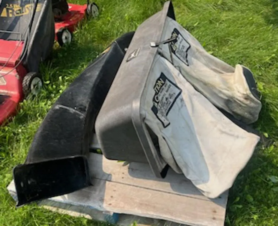 Rear bagger system for John Deere mower