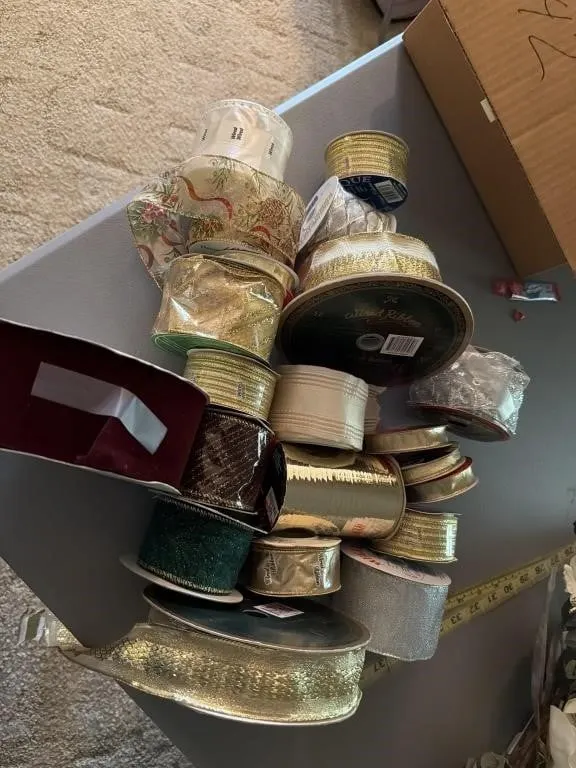 Box of Christmas ribbons and decorations