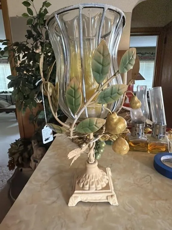 Decorative hurricane candle holder with metal