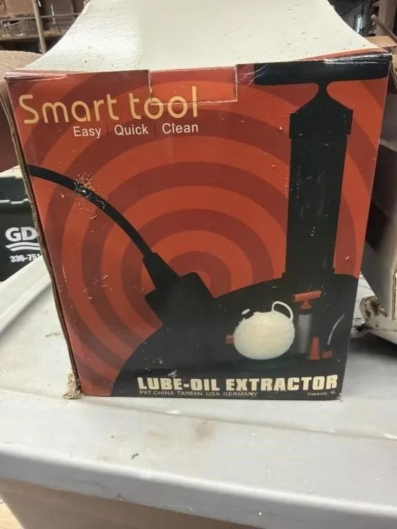 Lube oil extractor and 5 gallon bucket