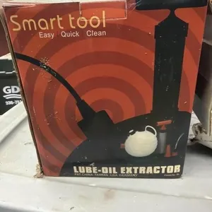 Lube oil extractor and 5 gallon bucket
