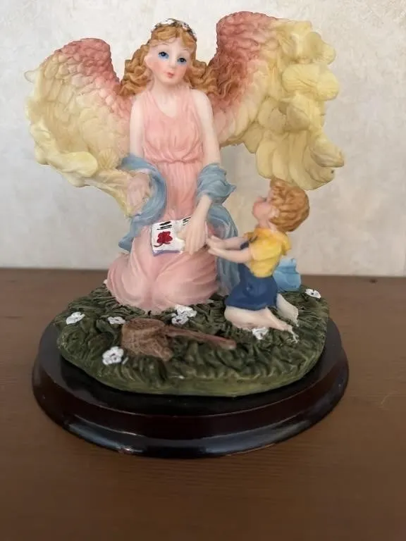 Angel reading to kids