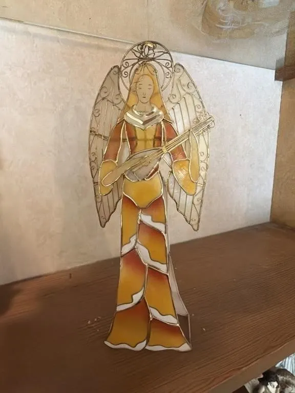 Metal stained angel