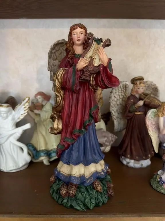 Medium angel playing a harp