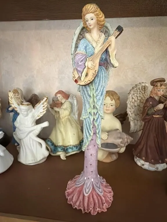 Medium angel playing a harp
