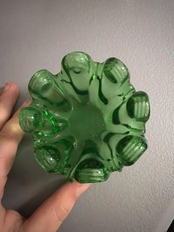Green glass tea light holder
