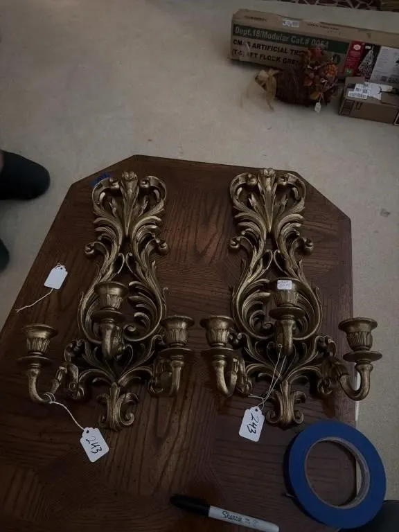 Two plastic ornamental three place candle holders
